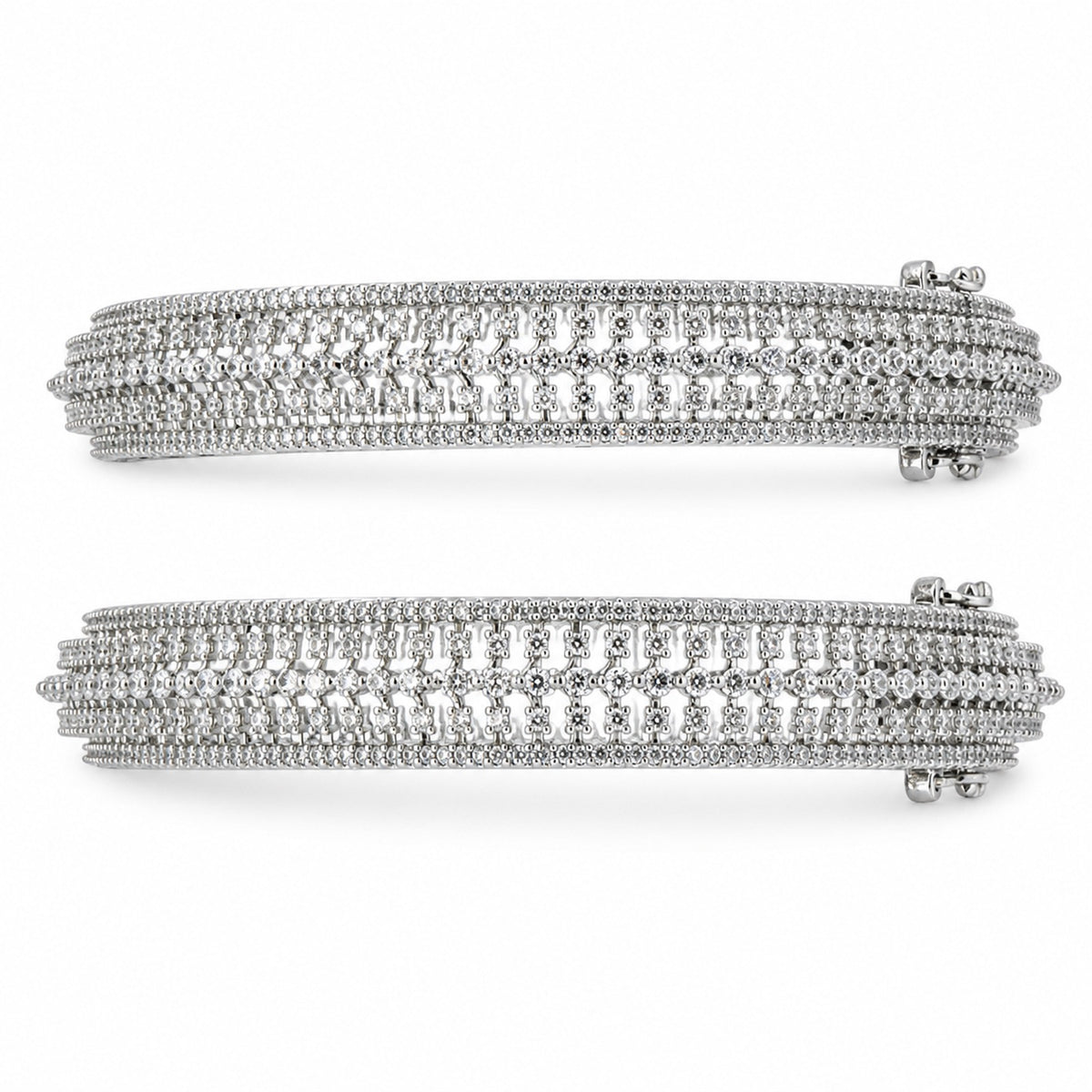 Silver-tone cubic zirconia bangle set, close-up detail
