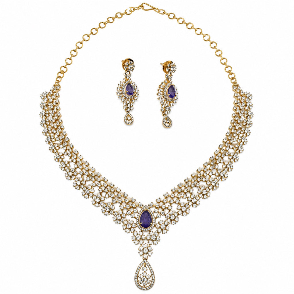 Layered gold-plated cubic zirconia necklace and earring set in royal purple, front view