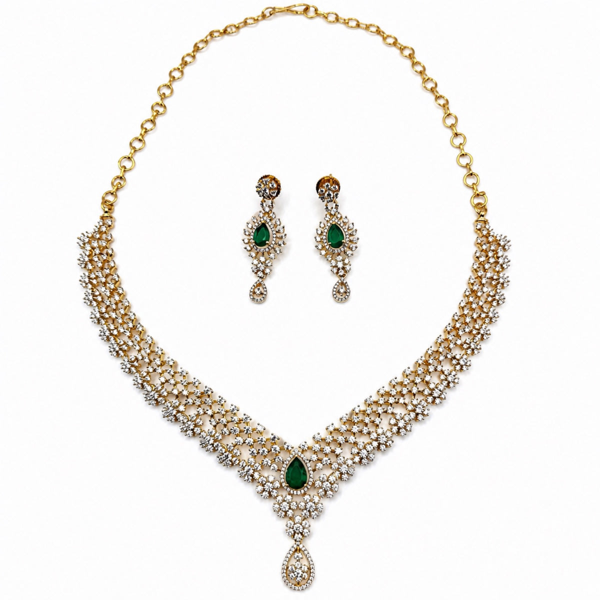 Layered gold-plated cubic zirconia necklace and earring set in emerald green, front view