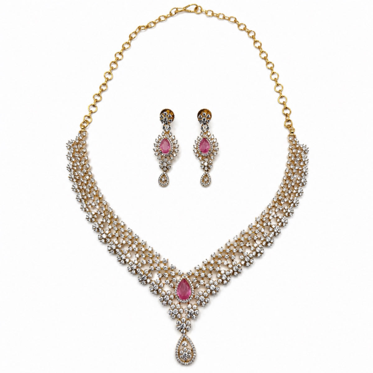 Layered gold-plated cubic zirconia necklace and earring set in blush pink, front view